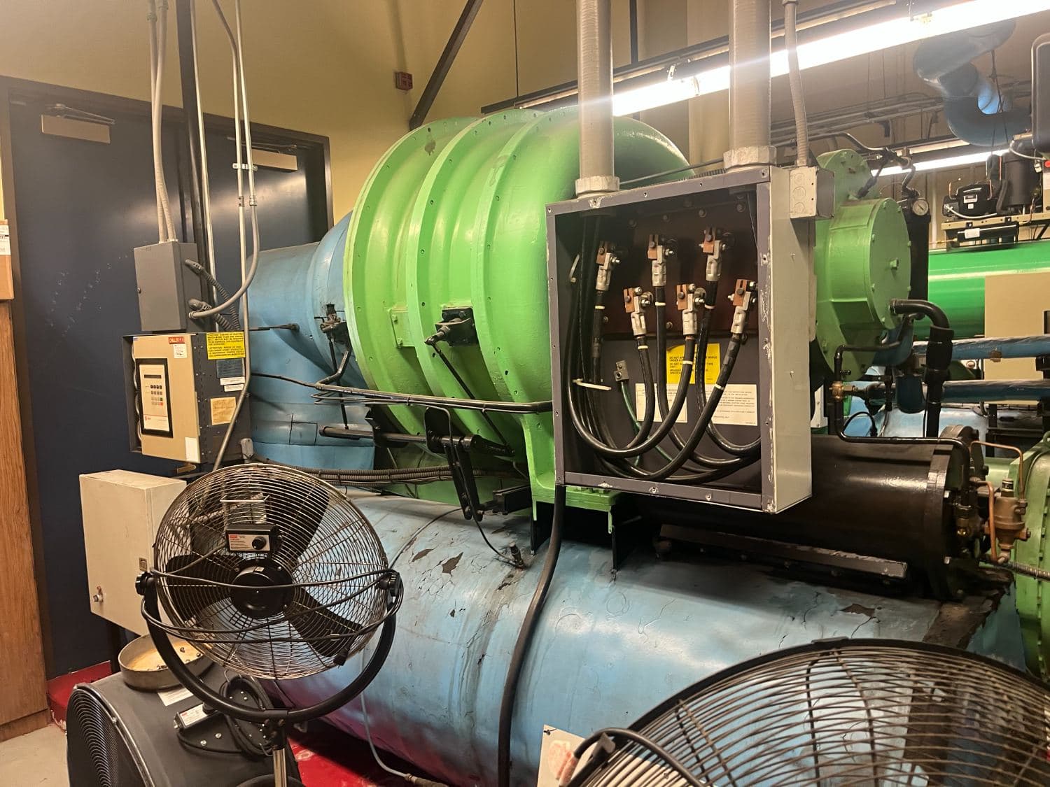 Central plant chiller and compressor in a mechanical room