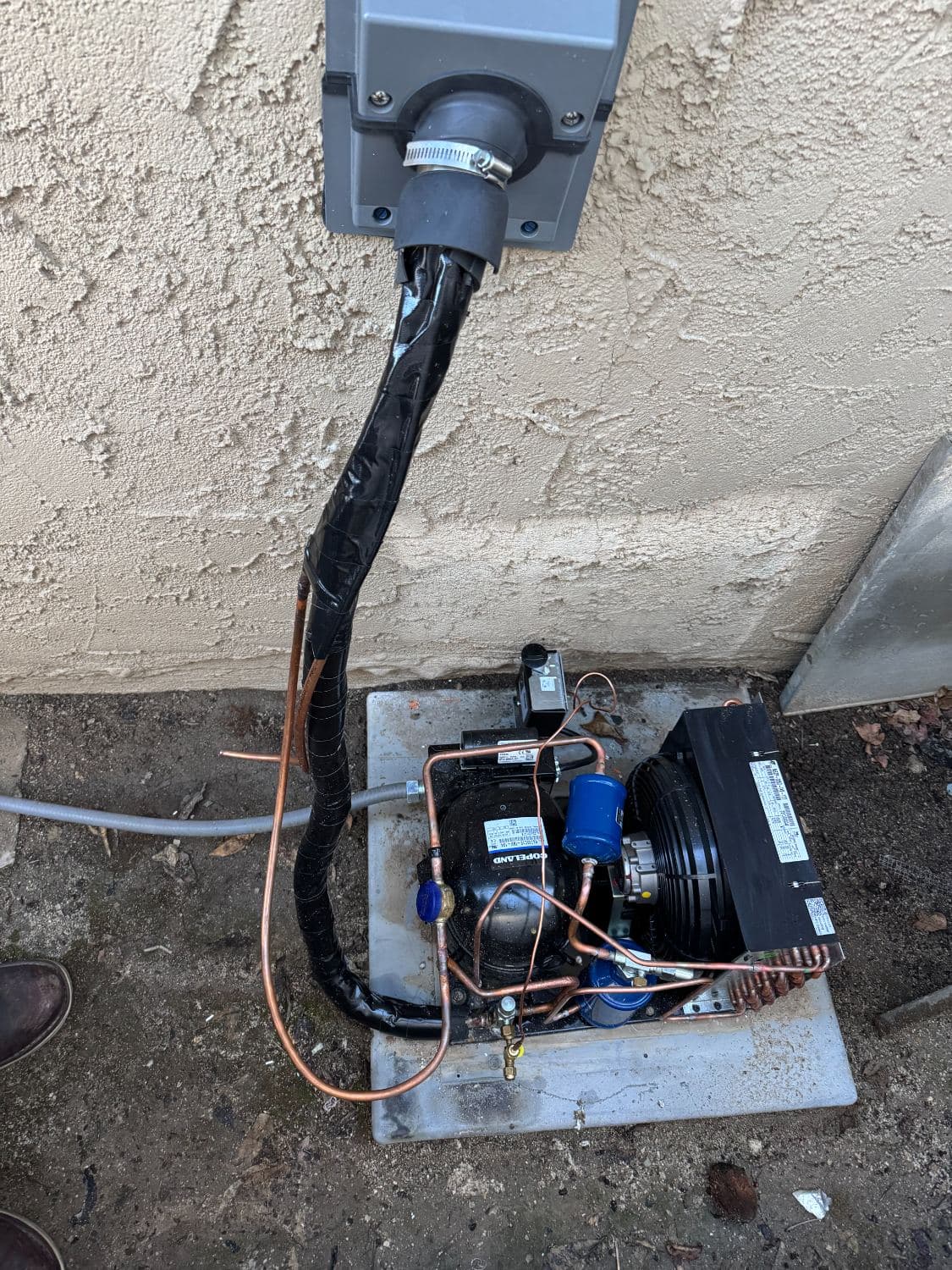 New residential condensing unit set on a pad