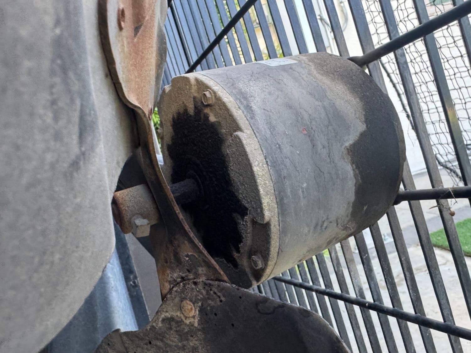 Failed condenser fan motor pulled from a residential unit