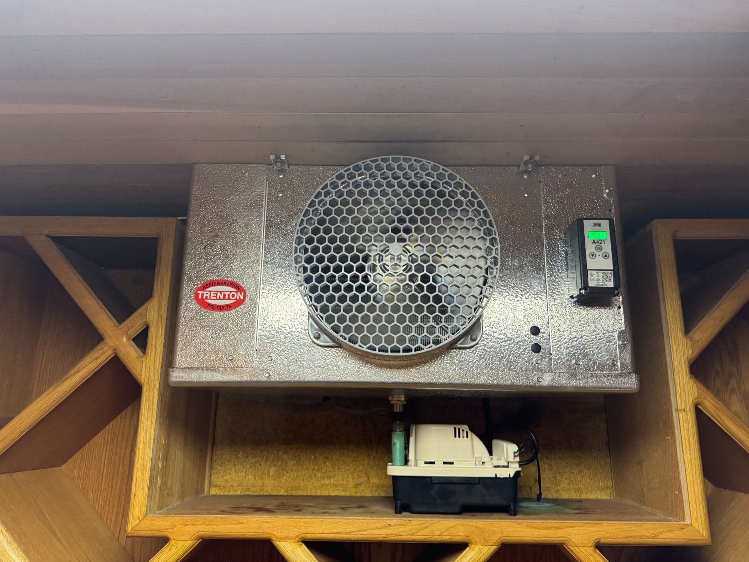 Evaporator and controller installed in a residential wine room